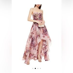 Wore only once for a gala. It’s a size 0/2 in perfect condition.